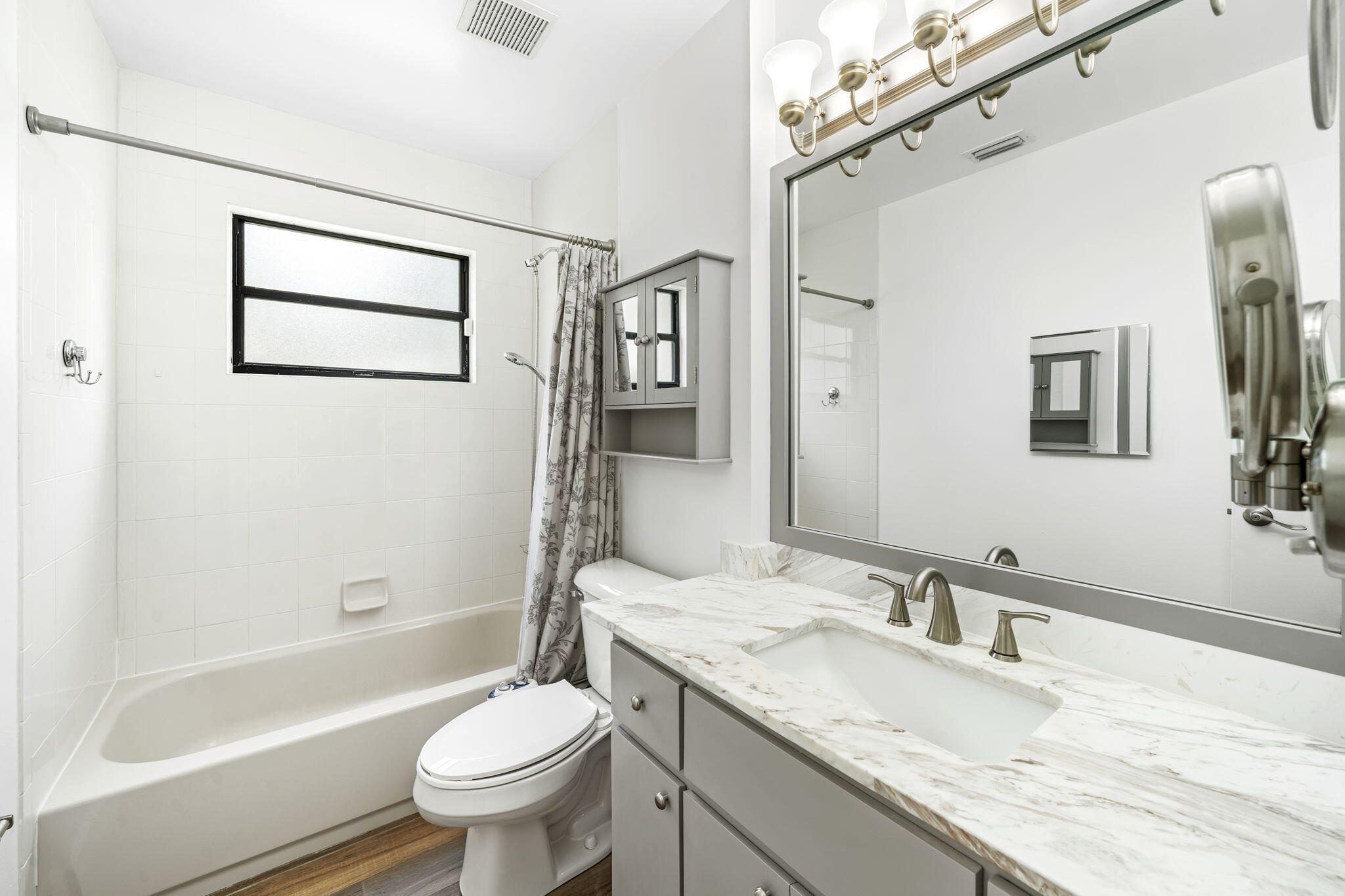 17876 43rd Road North Loxahatchee, FL 33470 - Photo 18 of 37 a bathroom with a granite countertop sink toilet and shower