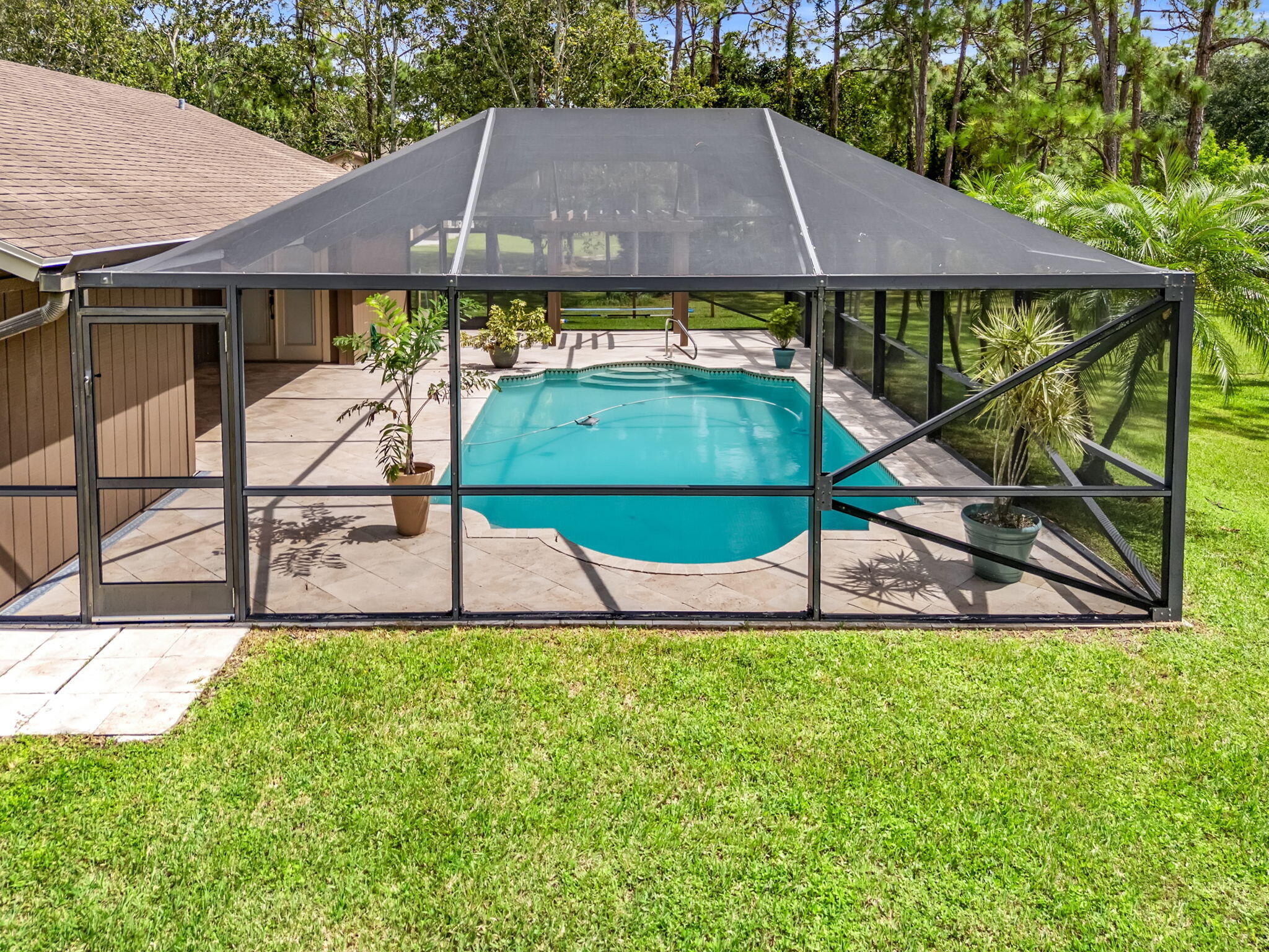 17876 43rd Road North Loxahatchee, FL 33470 - Photo 24 of 37 a view of a backyard with a small cabin