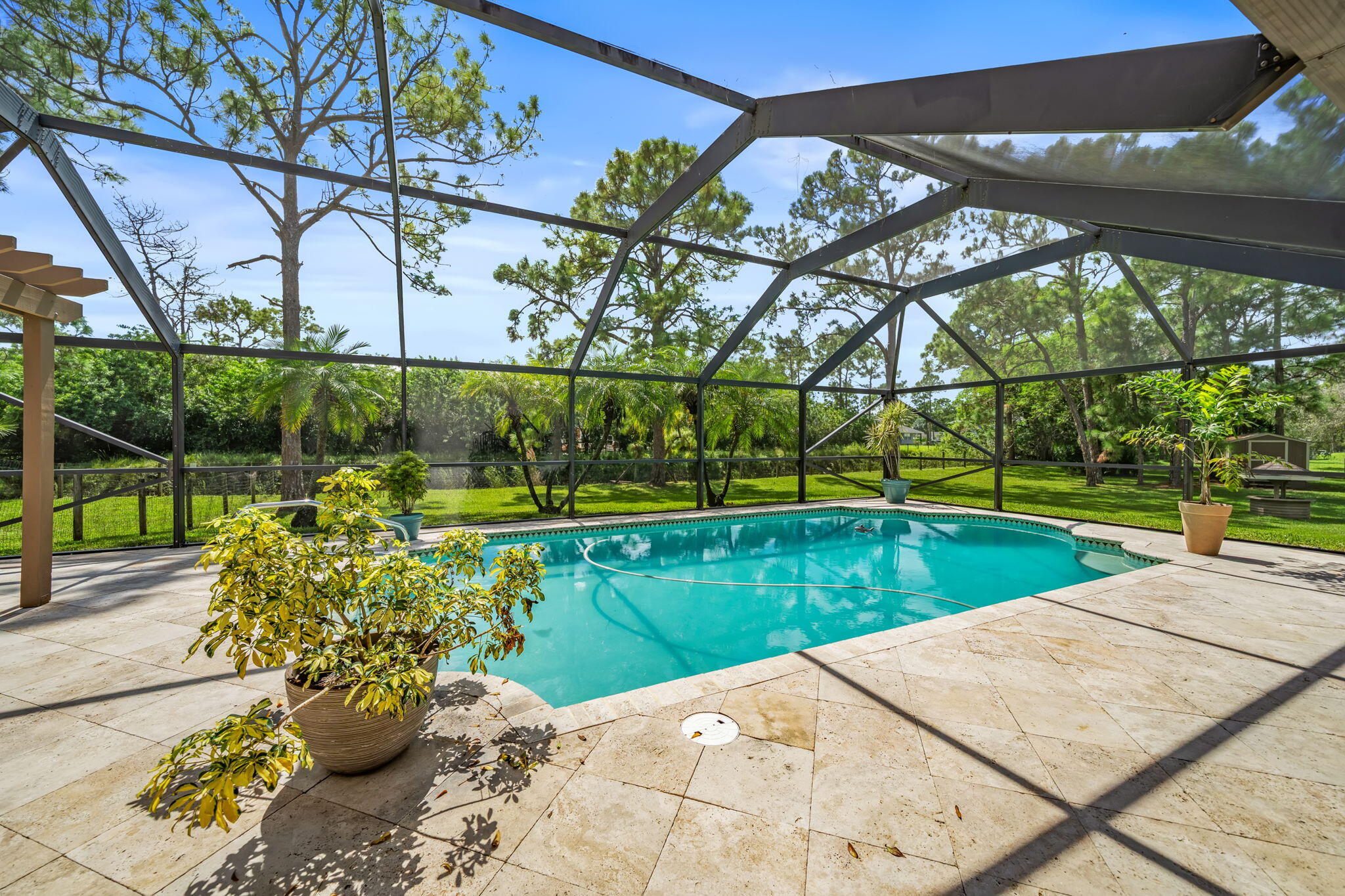 17876 43rd Road North Loxahatchee, FL 33470 - Photo 3 of 37 a view of a backyard