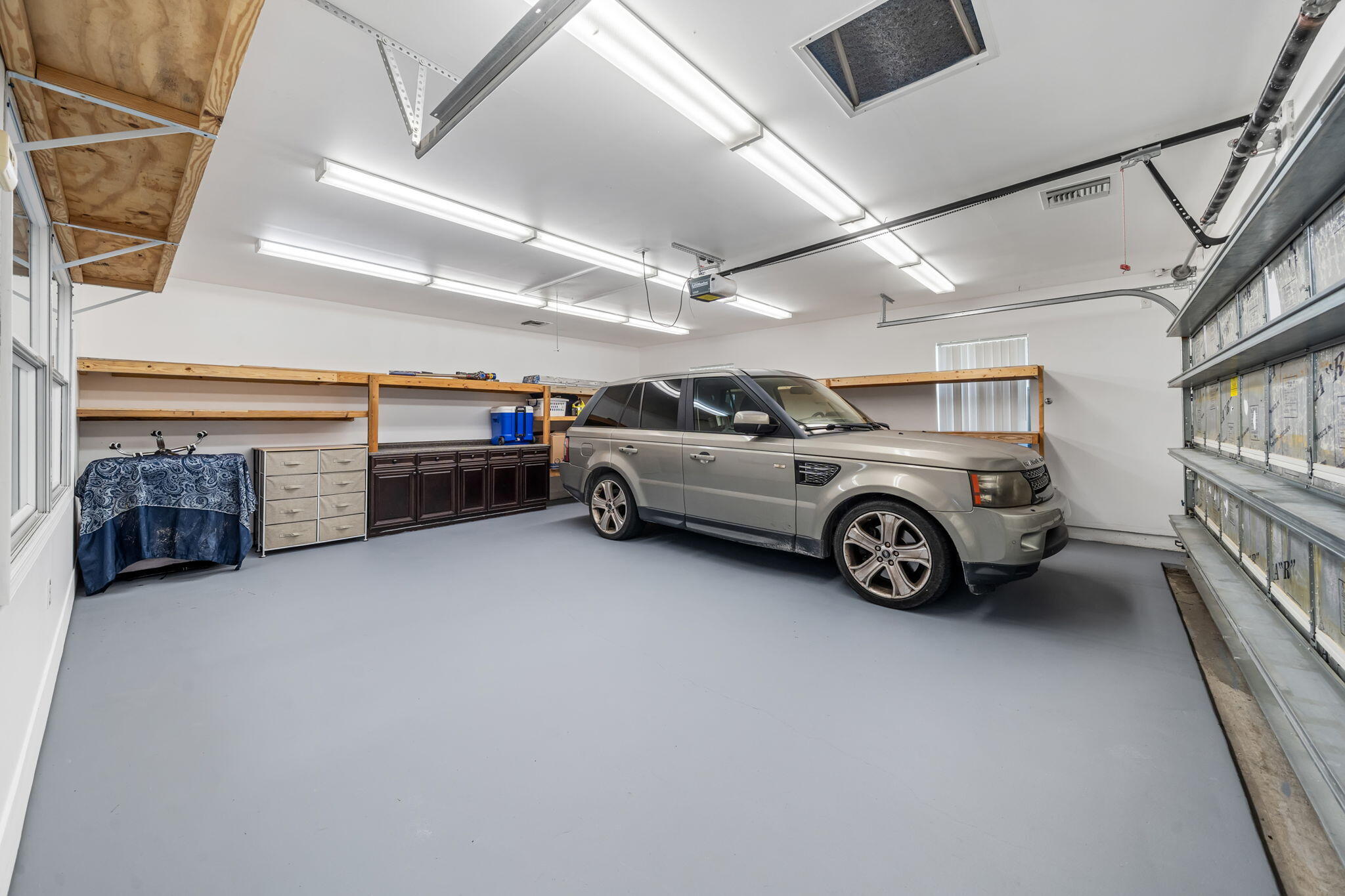 17876 43rd Road North Loxahatchee, FL 33470 - Photo 33 of 37 a view of parking garage with cars