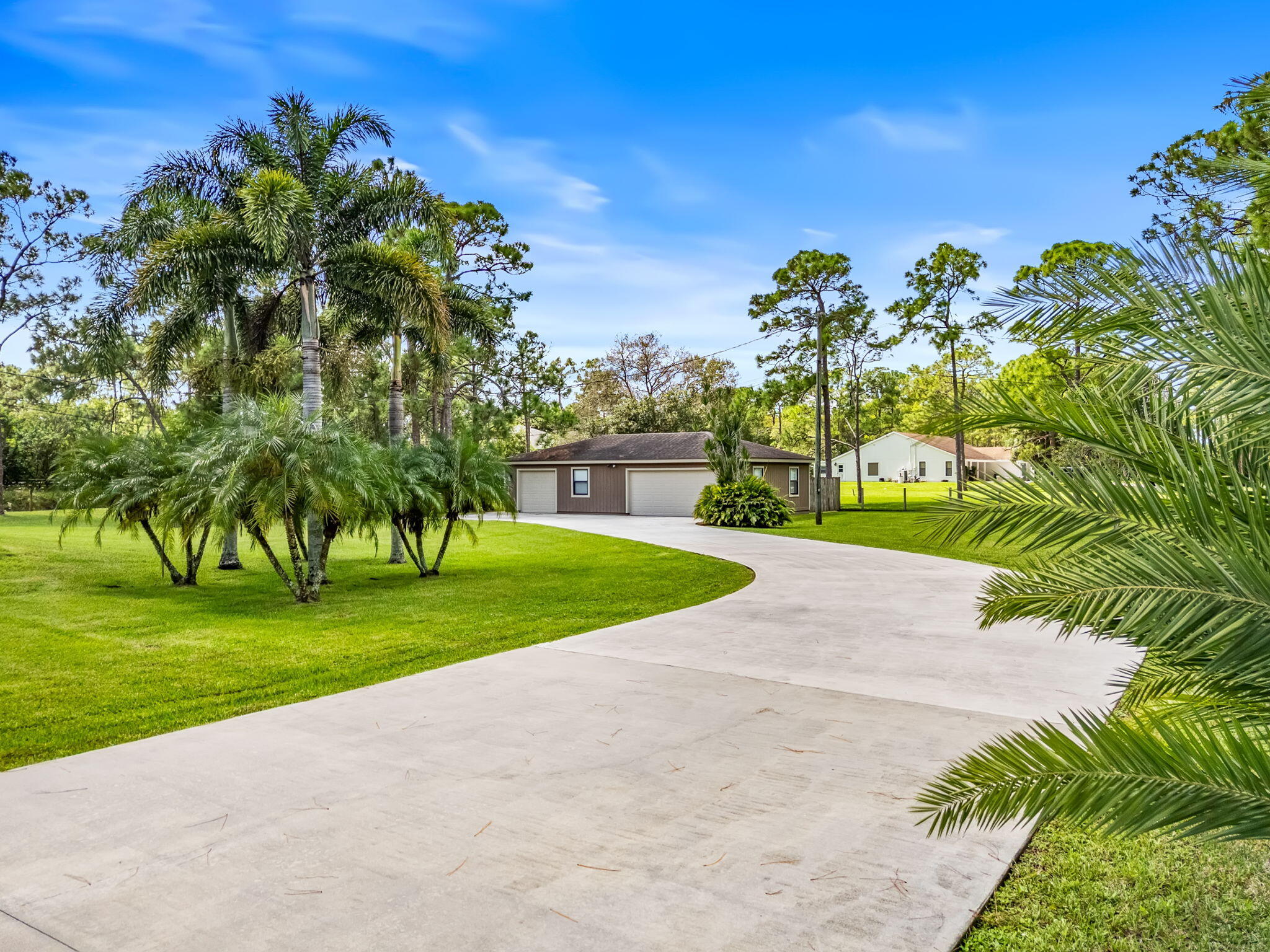 17876 43rd Road North Loxahatchee, FL 33470 - Photo 34 of 37 a view of a golf course with a garden