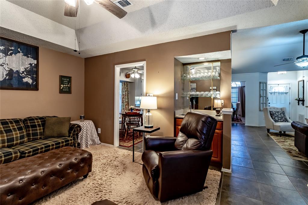 266 East Ridgegate Drive Garland, TX 75040 - Photo 11 of 32 a living room with furniture and wooden floor