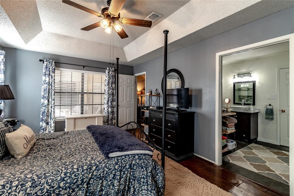 266 East Ridgegate Drive Garland, TX 75040 - Photo 19 of 32 a bedroom with a bed and window