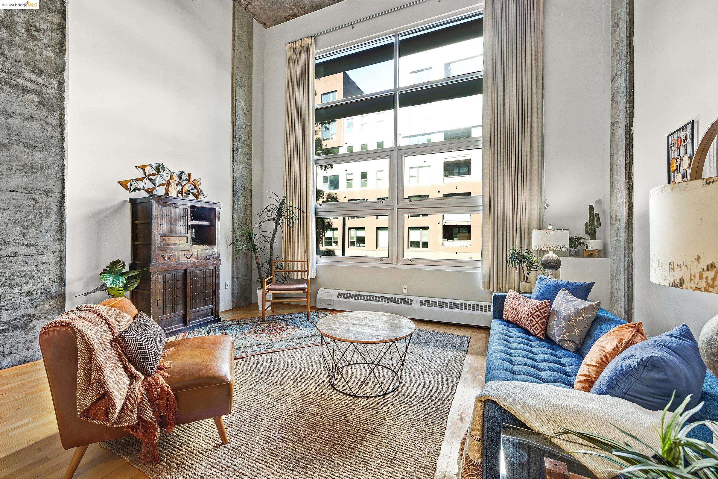 a living room with furniture and window
