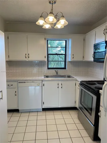 $230,000 | 9235 Southwest 8th Street, Unit 406, Boca Raton, FL 33428