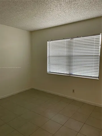 $230,000 | 9235 Southwest 8th Street, Unit 406, Boca Raton, FL 33428