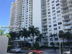 a front view of a building with street view
