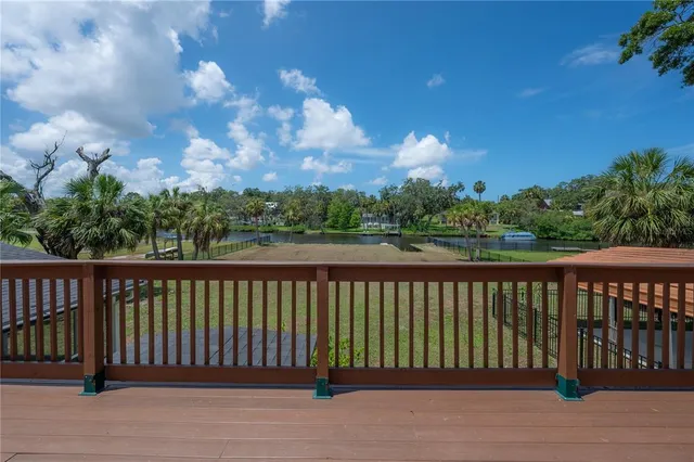 a view of swimming pool from a window