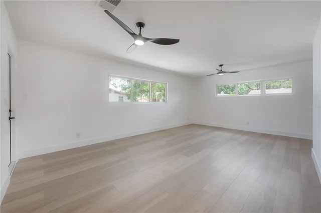 a bathroom with a sink a vanity and a mirror