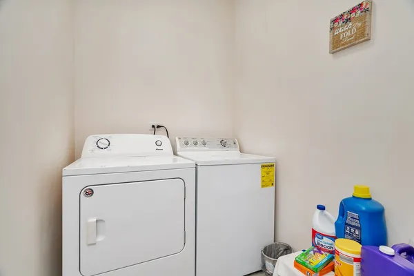 a utility room with dryer and washer