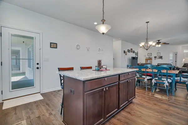 a view of a kitchen from a dining room
