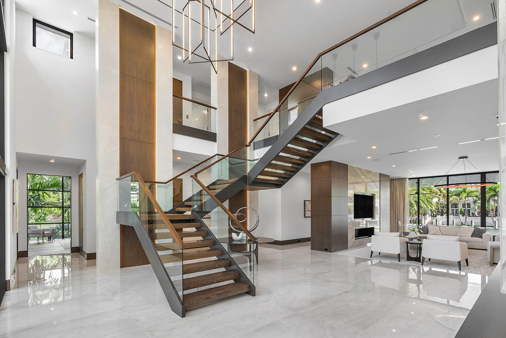 298 West Key Palm Road Boca Raton, FL 33432 - Photo 44 of 82 a view of entryway and hall with dining room