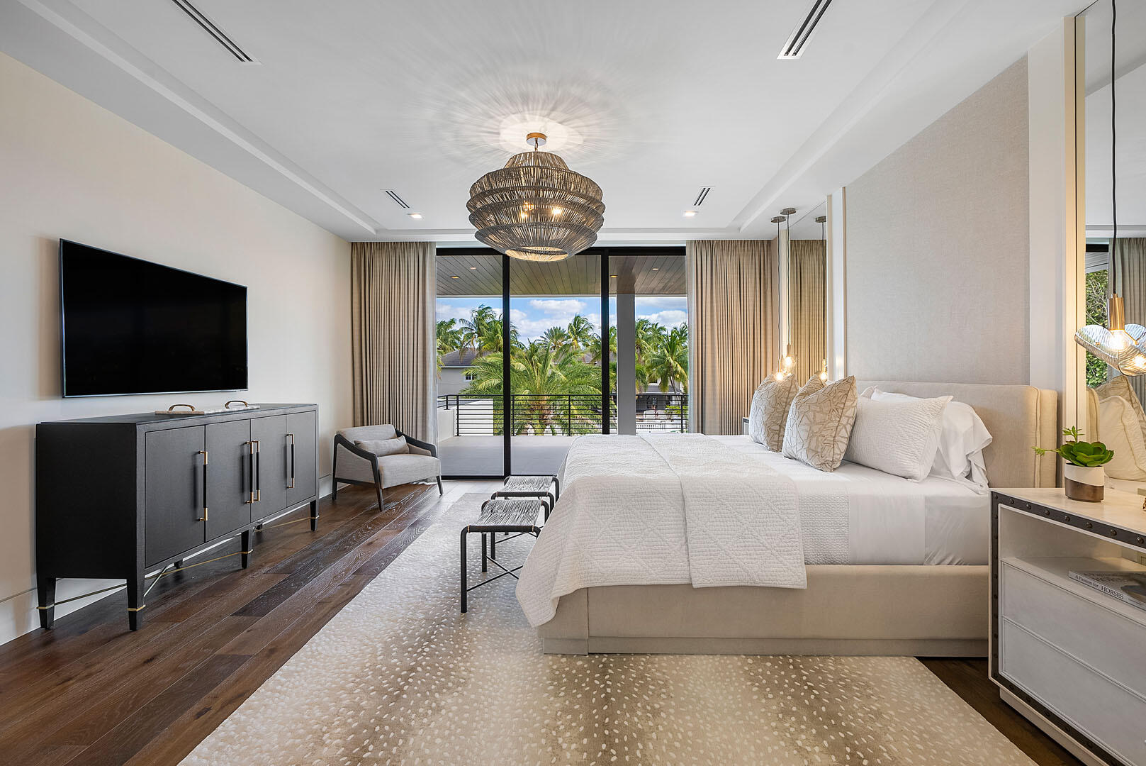 298 West Key Palm Road Boca Raton, FL 33432 - Photo 51 of 82 a bedroom with a bed and a flat screen tv