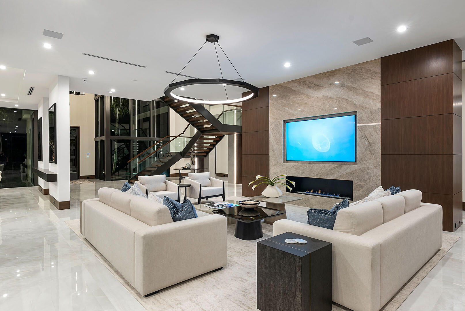 298 West Key Palm Road Boca Raton, FL 33432 - Photo 62 of 82 a living room with furniture a ceiling fan and a rug
