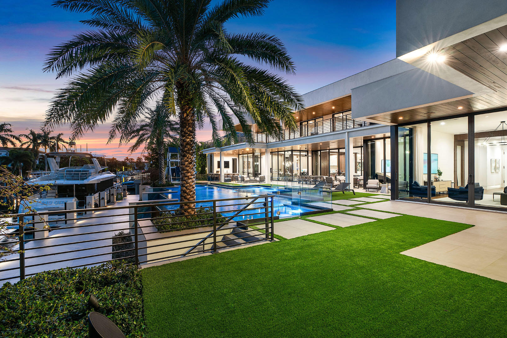 298 West Key Palm Road Boca Raton, FL 33432 - Photo 69 of 82 a view of a house with swimming pool and sitting area