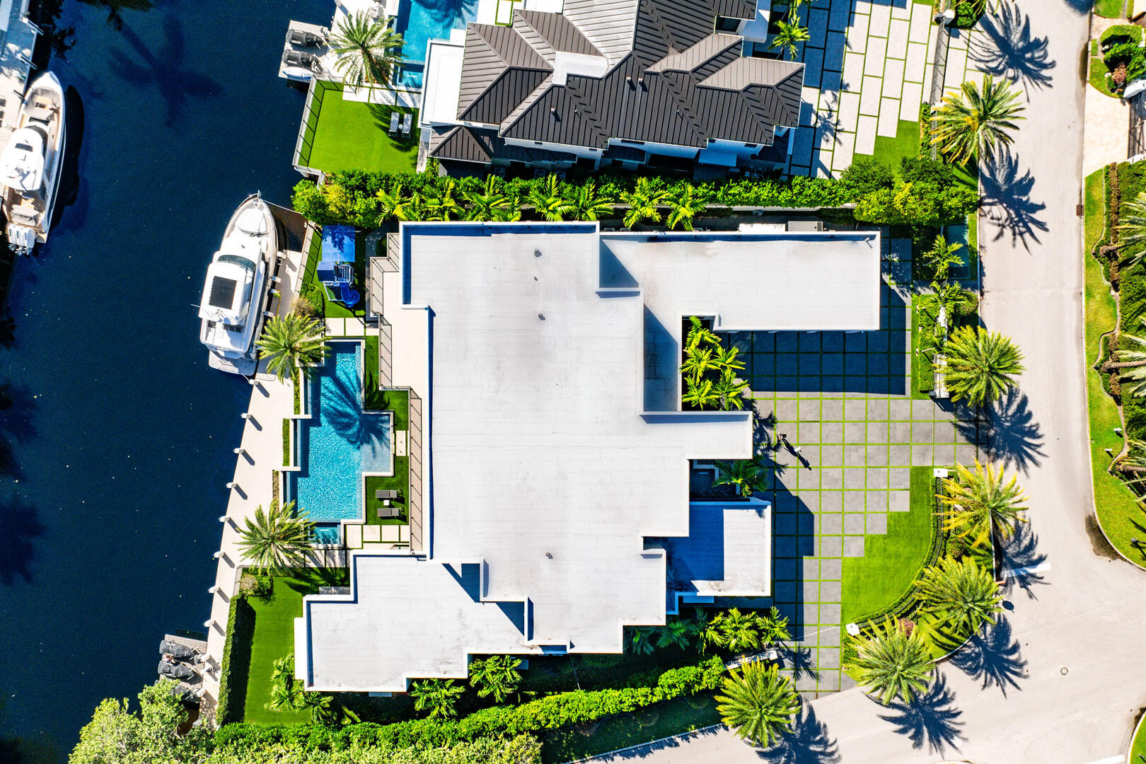 298 West Key Palm Road Boca Raton, FL 33432 - Photo 80 of 82 an aerial view of a house with a yard and garden