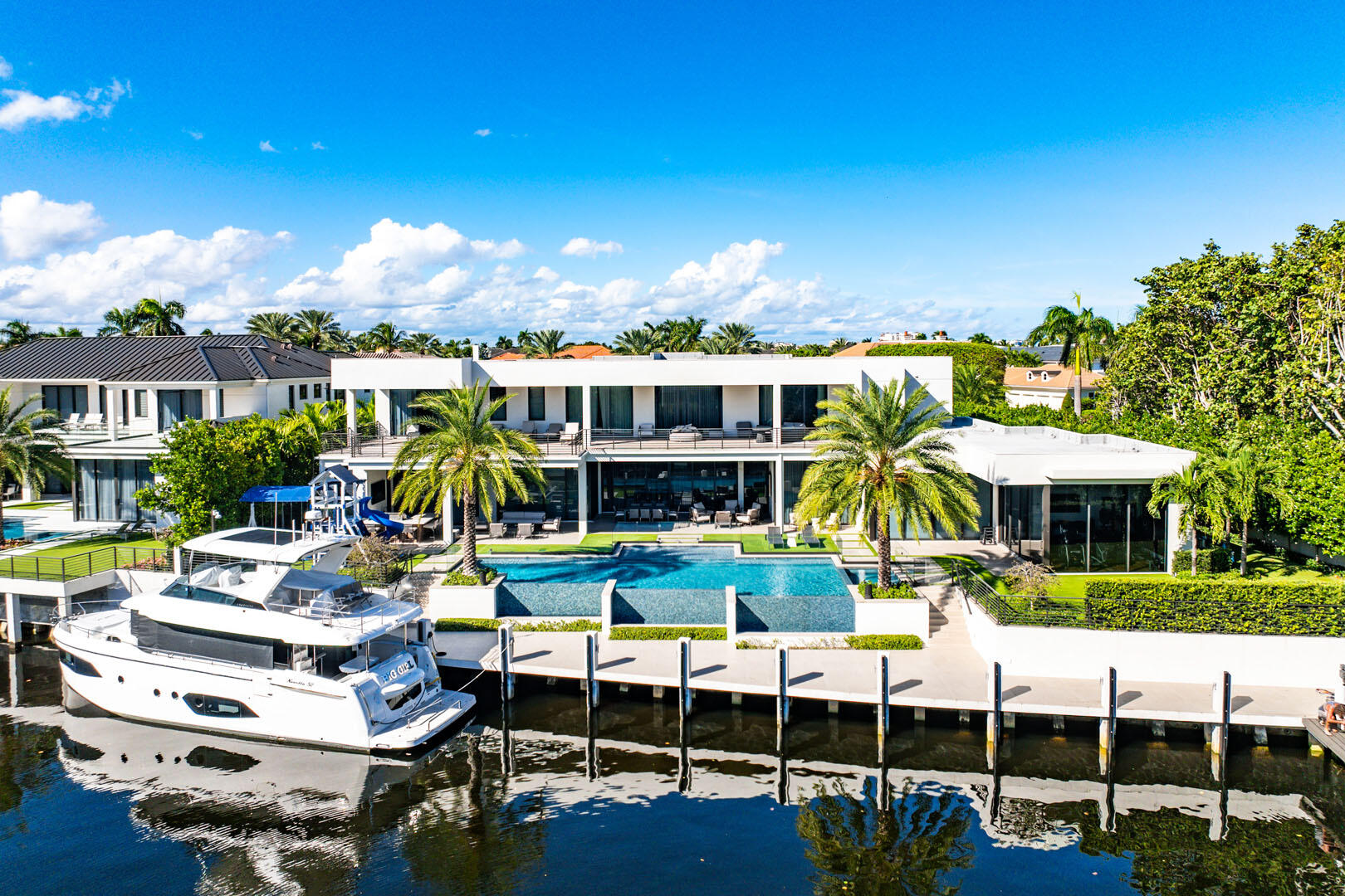 298 West Key Palm Road Boca Raton, FL 33432 - Photo 81 of 82 a view of a chairs and table in a yard