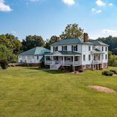a view of a house with swimming pool