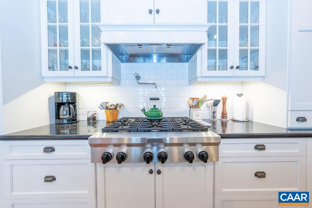 1571 Celt Road Stanardsville, VA 22973 - Photo 15 of 66 a kitchen with stainless steel appliances granite countertop a sink and cabinets