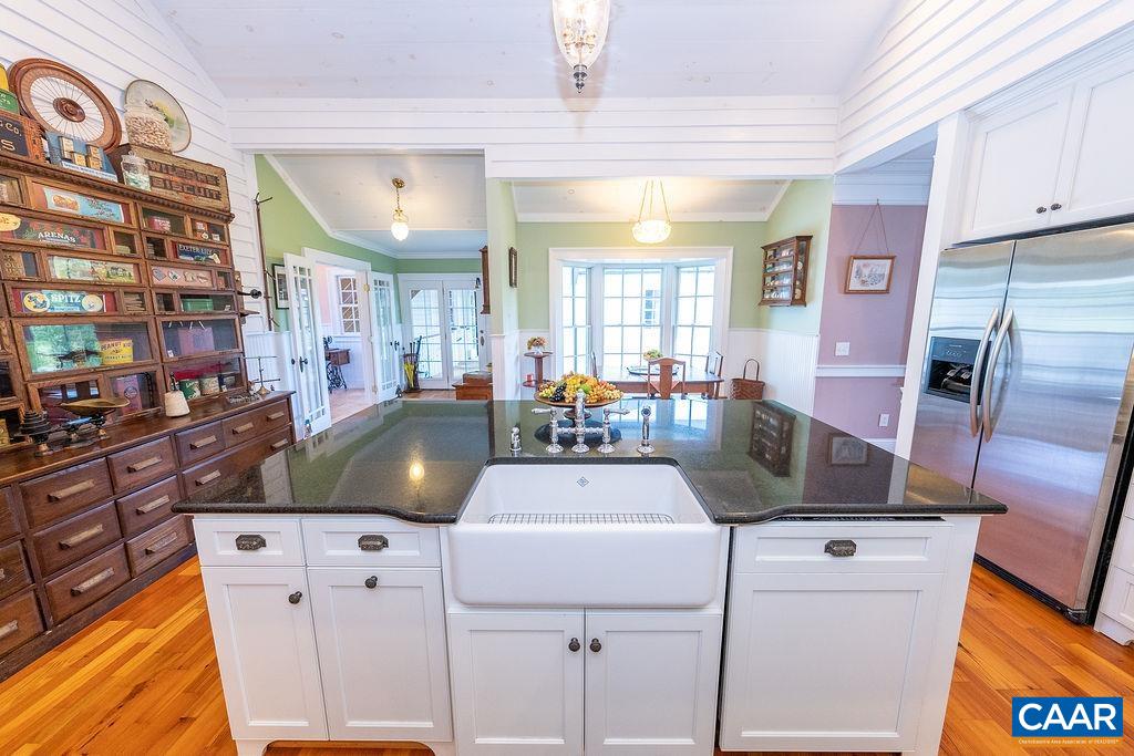 1571 Celt Road Stanardsville, VA 22973 - Photo 17 of 66 a kitchen with stainless steel appliances granite countertop a sink and cabinets