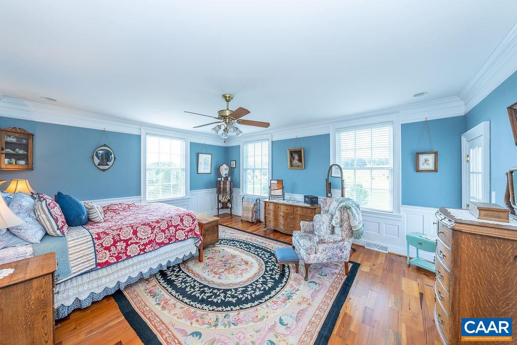 1571 Celt Road Stanardsville, VA 22973 - Photo 19 of 66 a living room with furniture and a wooden floor