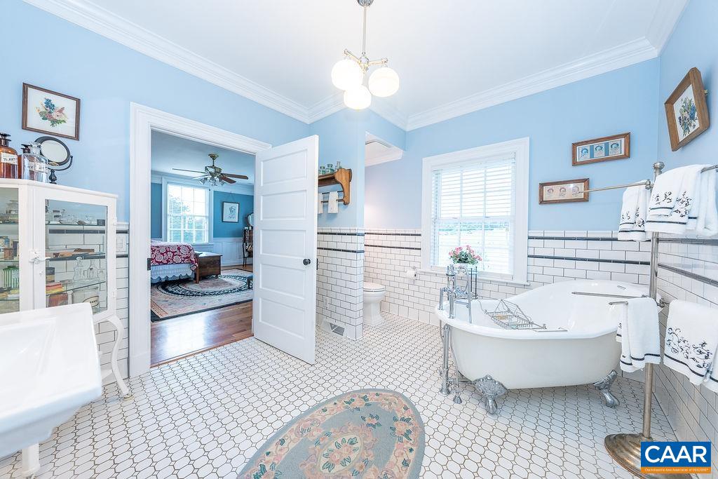 1571 Celt Road Stanardsville, VA 22973 - Photo 21 of 66 a spacious bathroom with a bathtub and shower