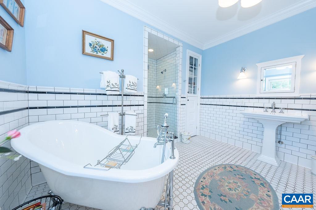 1571 Celt Road Stanardsville, VA 22973 - Photo 22 of 66 a bath room with a sink and a mirror