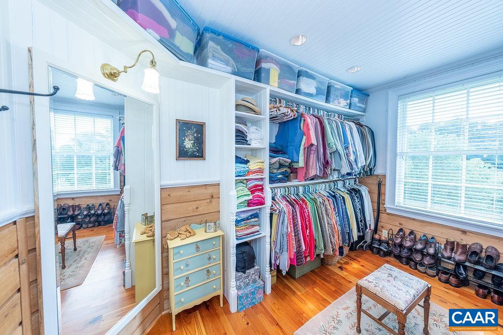 1571 Celt Road Stanardsville, VA 22973 - Photo 23 of 66 a view of walk in closet with clothes and shoes