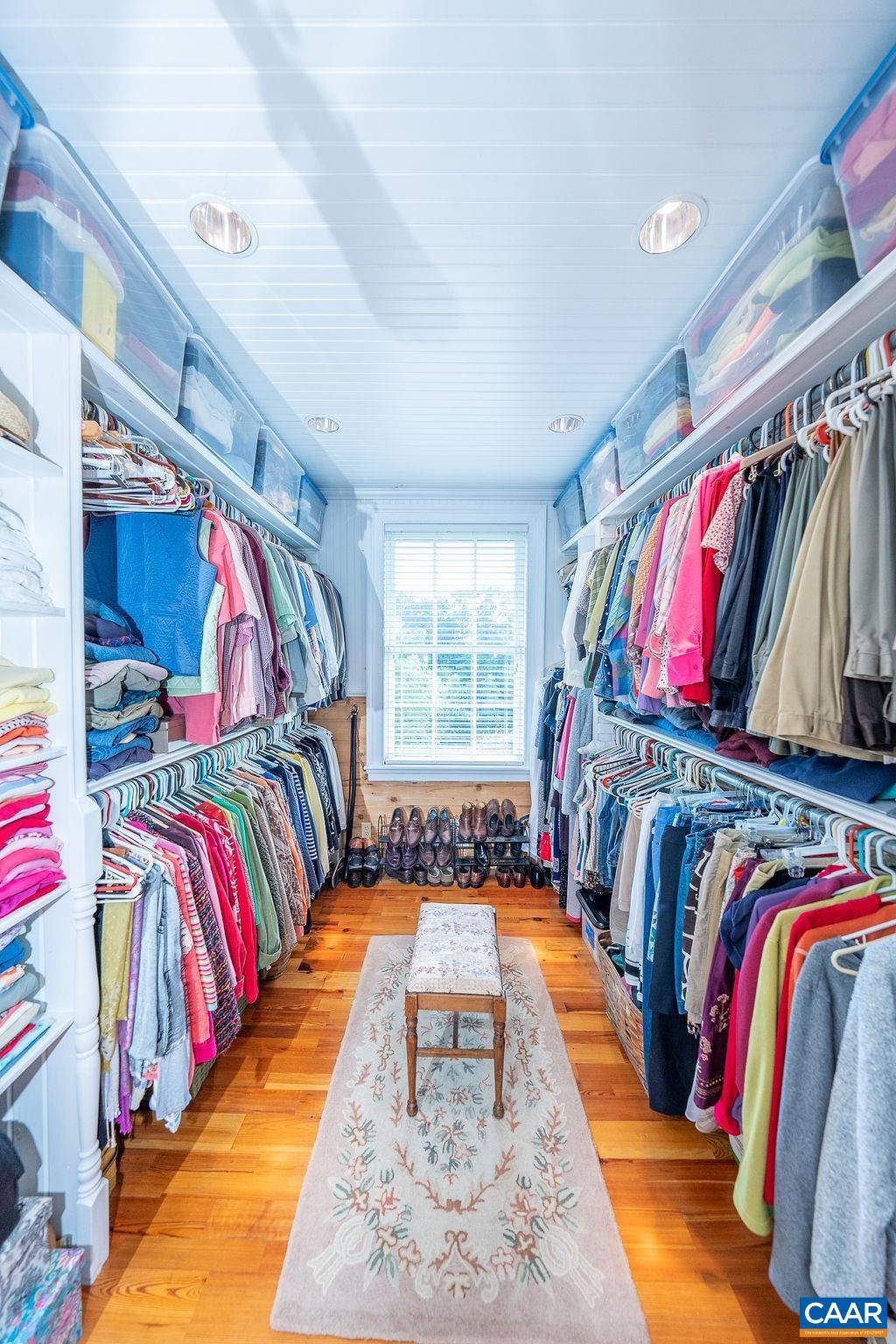 1571 Celt Road Stanardsville, VA 22973 - Photo 24 of 66 a view of walk in closet with clothes and shoes