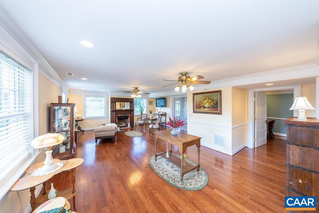 1571 Celt Road Stanardsville, VA 22973 - Photo 39 of 66 a living room with fireplace furniture and wooden floor