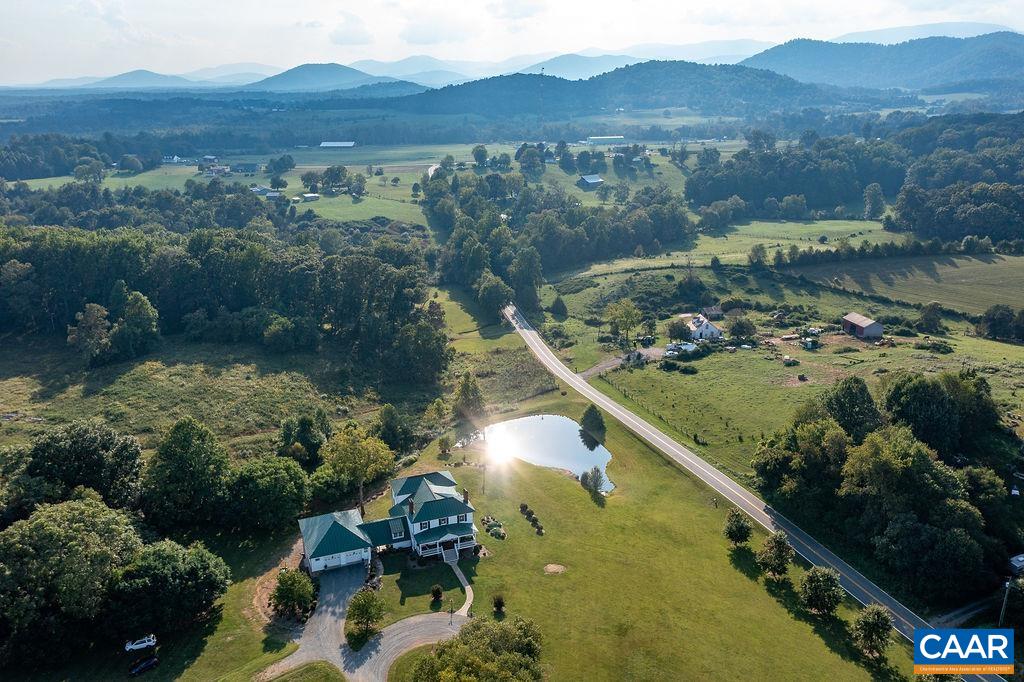 1571 Celt Road Stanardsville, VA 22973 - Photo 58 of 66 a view of a lake with a mountain