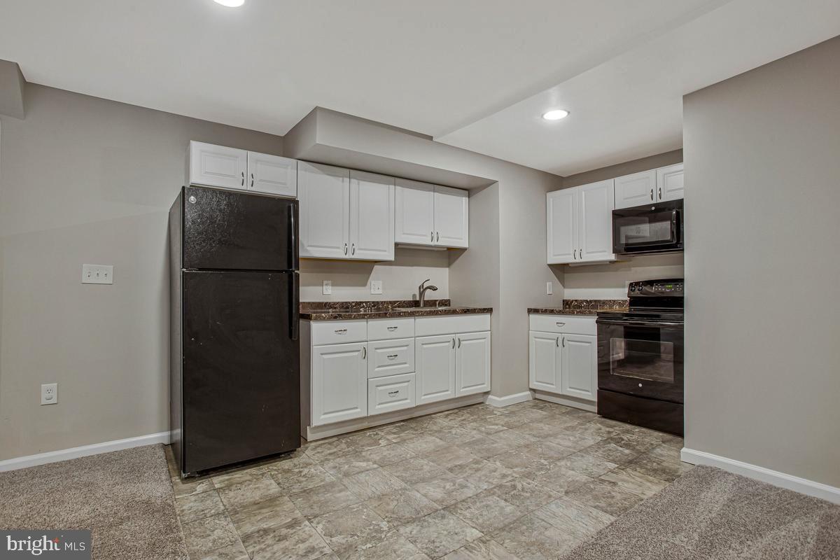 6521 Wilson Road Friendship, MD 20758 - Photo 37 of 55 Lower Level Kitchenette