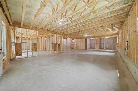 a view of a room with wooden walls