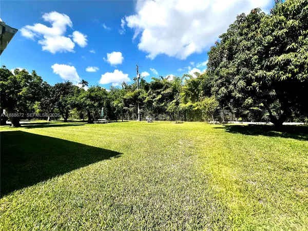 a view of a house with swimming pool