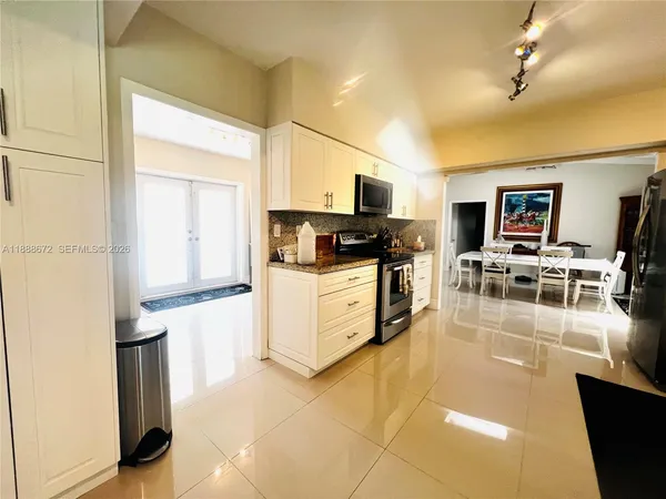 a front view of a house with swimming pool