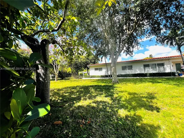a view of a house with a swimming pool
