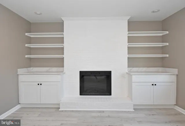 a room with a couch and a window