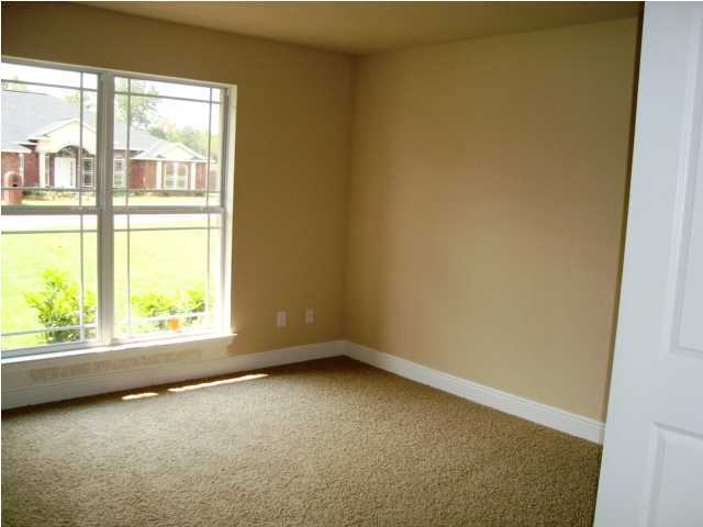 3056 Wallace Lake Road Pace, FL 32571 - Photo 17 of 19 an empty room with a window