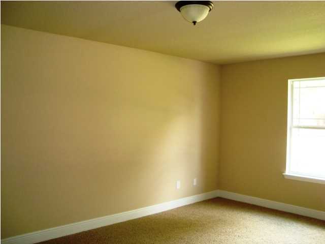 3056 Wallace Lake Road Pace, FL 32571 - Photo 19 of 19 an empty room with a window