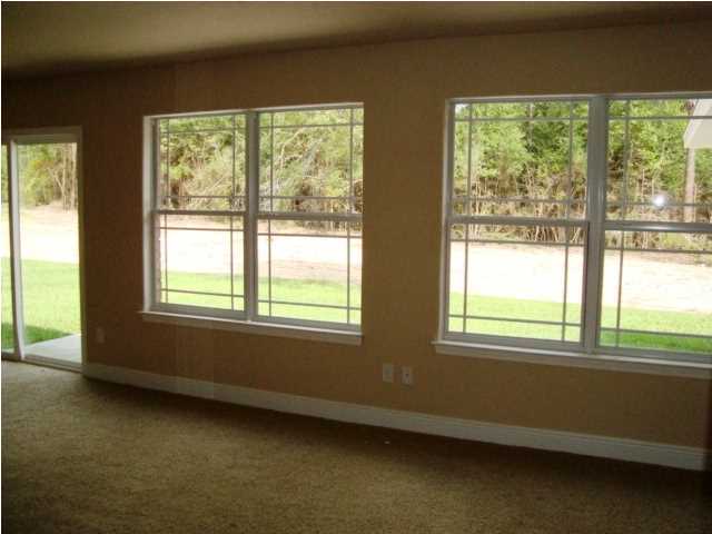 3056 Wallace Lake Road Pace, FL 32571 - Photo 6 of 19 a view of an empty room with a window