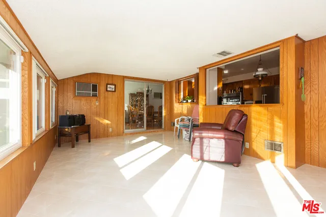 a bathroom with a sink a mirror and a shower