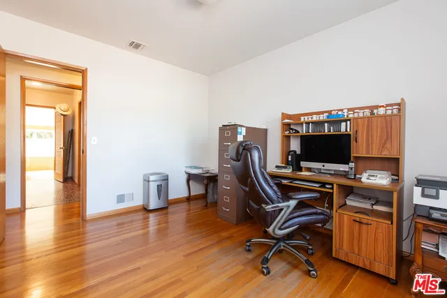 a bathroom with a toilet and shower