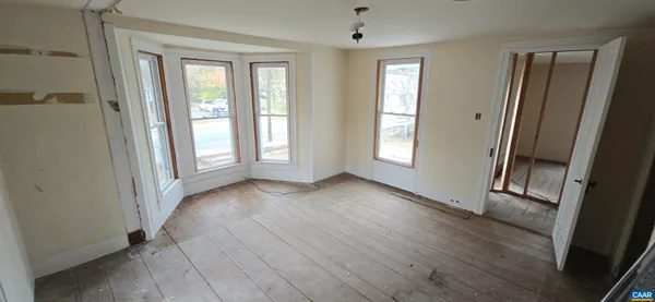 an aerial view of residential houses and outdoor space