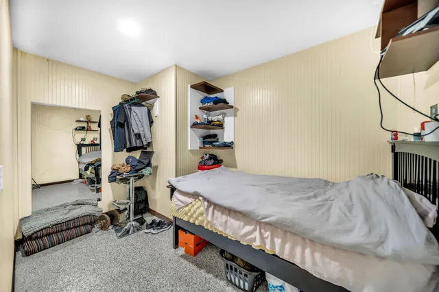 a view of a back yard with pathway