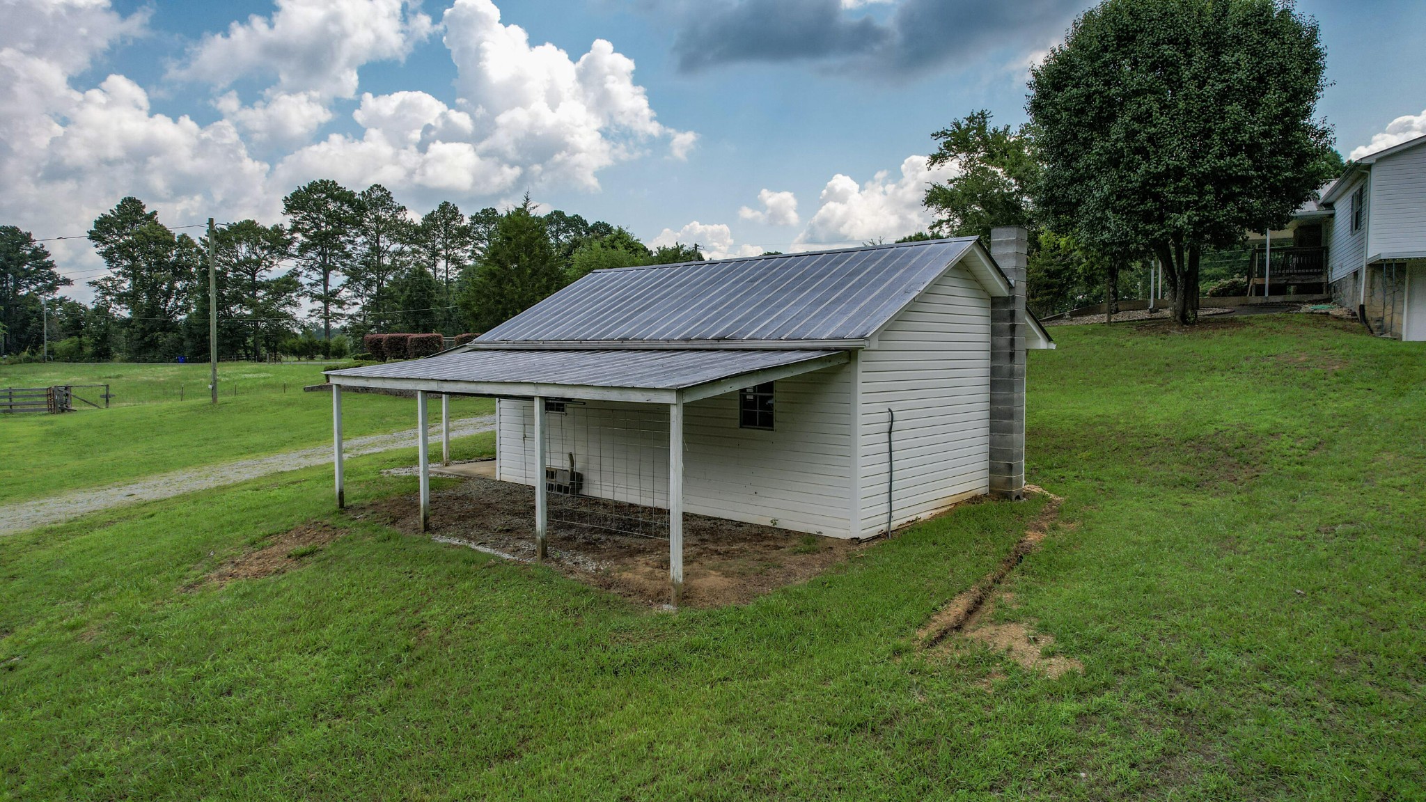 428 Caldwell Road Southeast Cleveland, TN 37323 - Photo 11 of 91 a view of a house with a backyard