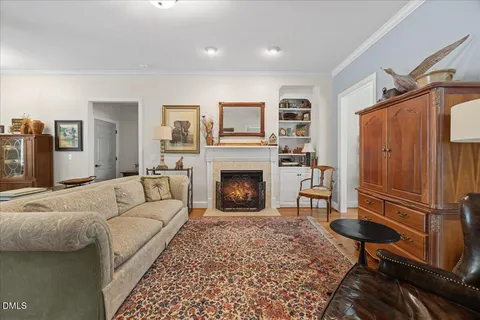a living room with furniture and a table
