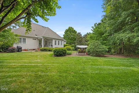a house view with a garden space