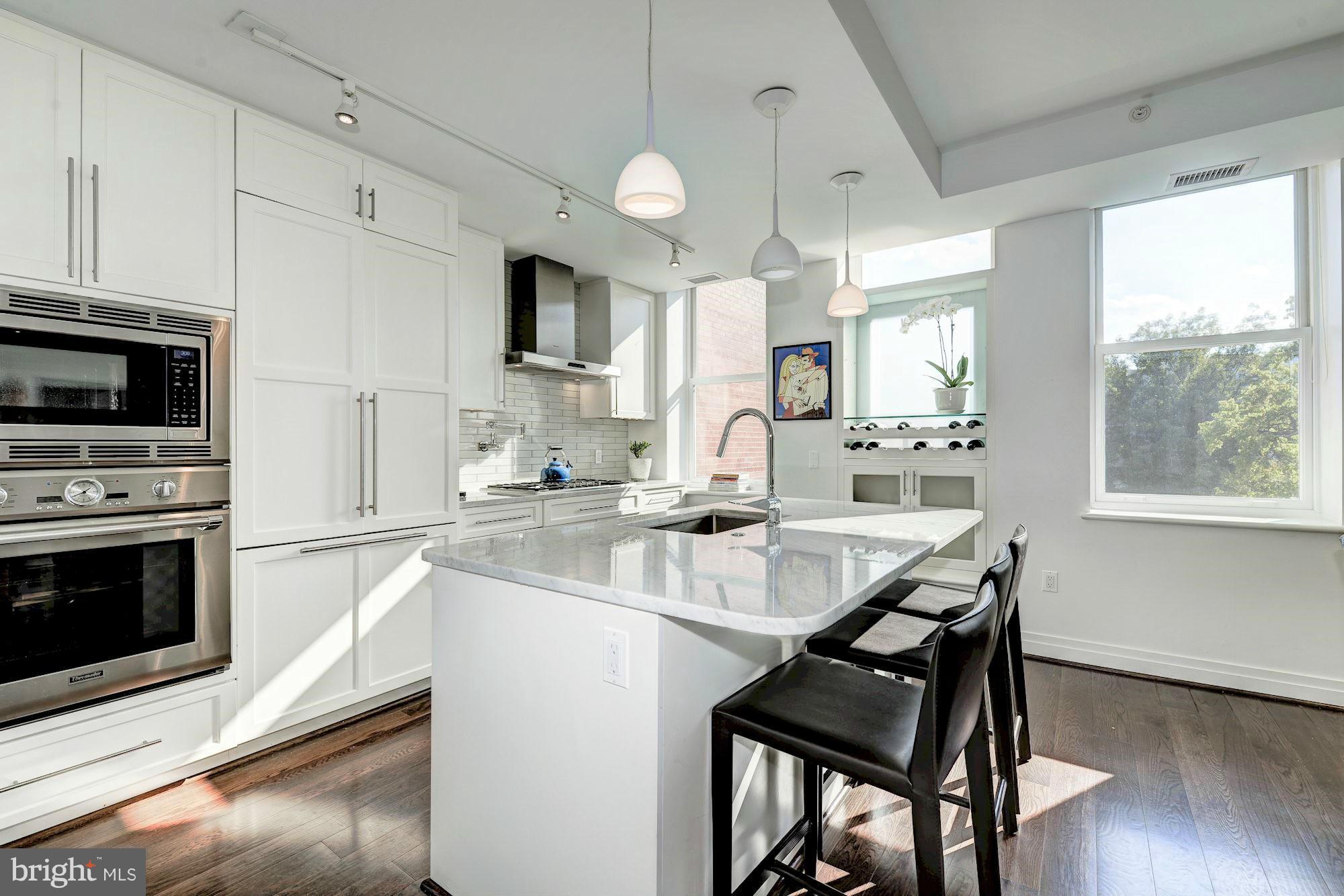 3052 R Street Northwest, Unit 303 Washington, DC 20007 - Photo 2 of 30 A KITCHEN WITH A VIEW
