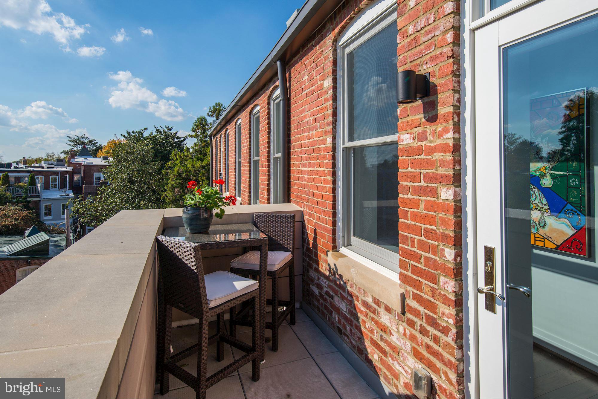 3052 R Street Northwest, Unit 303 Washington, DC 20007 - Photo 20 of 30 PRIVATE TERRACE FACING SUNSETS