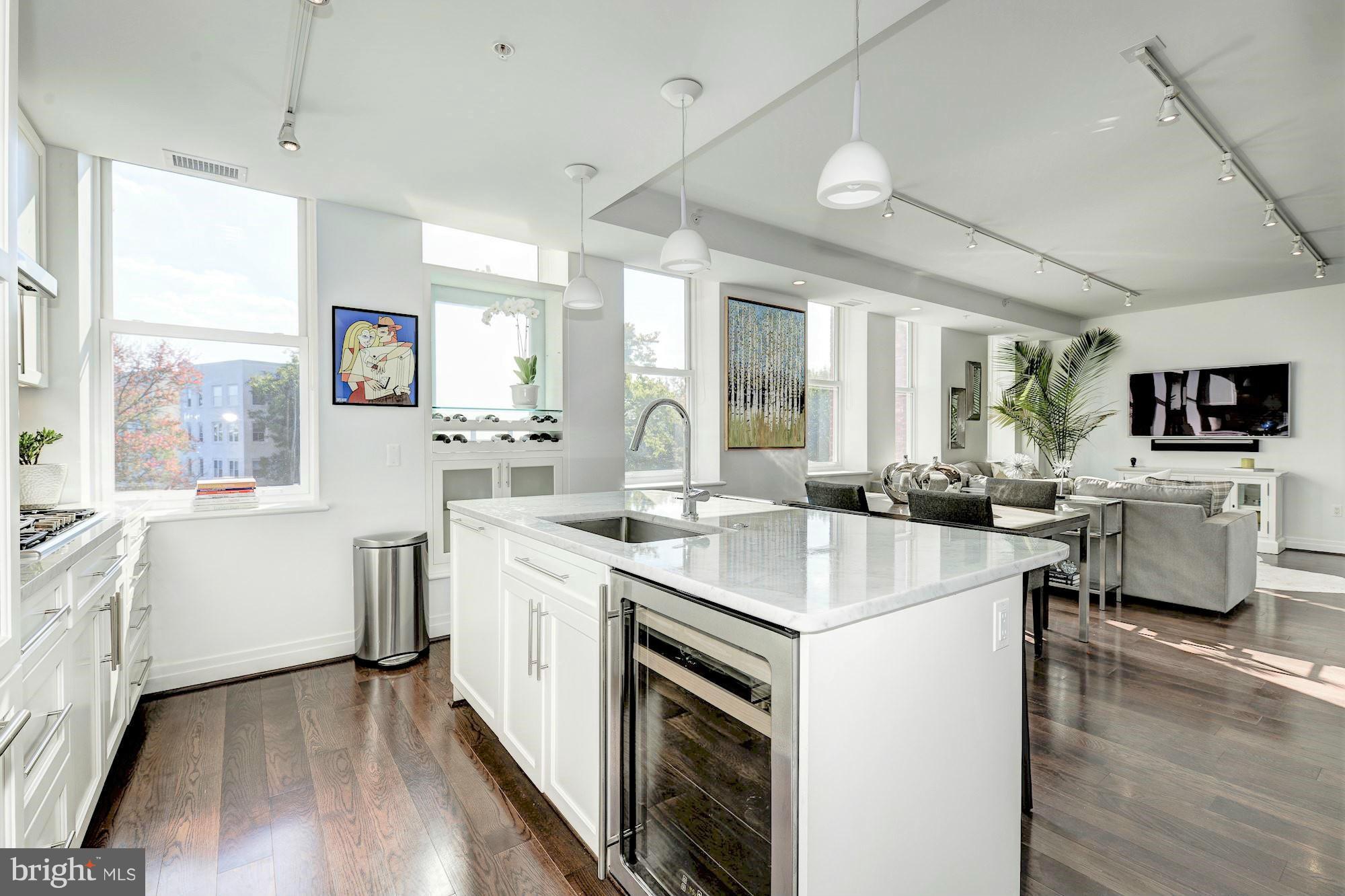 3052 R Street Northwest, Unit 303 Washington, DC 20007 - Photo 3 of 30 STAINLESS APPLIANCES, CARRARA MARBLE